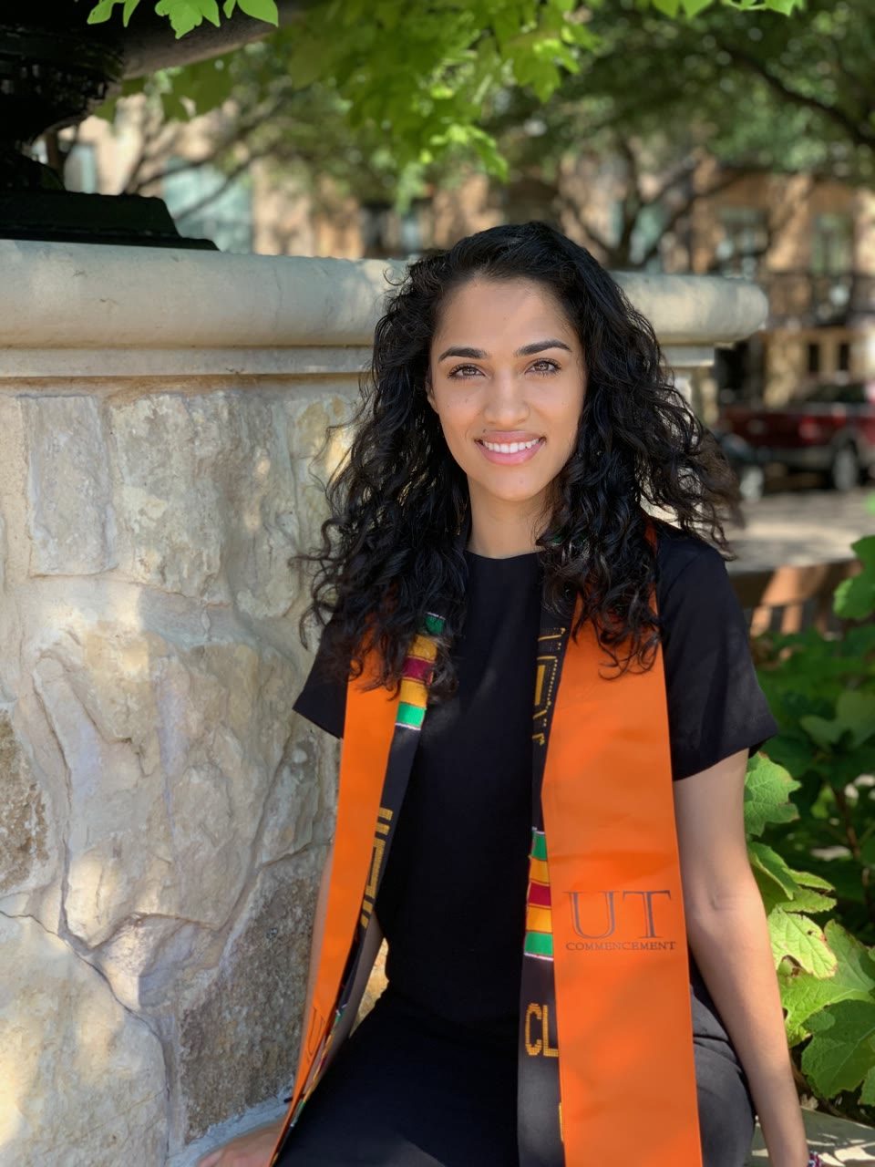Hazel Mohamedali celebrating her UT Austin graduation
